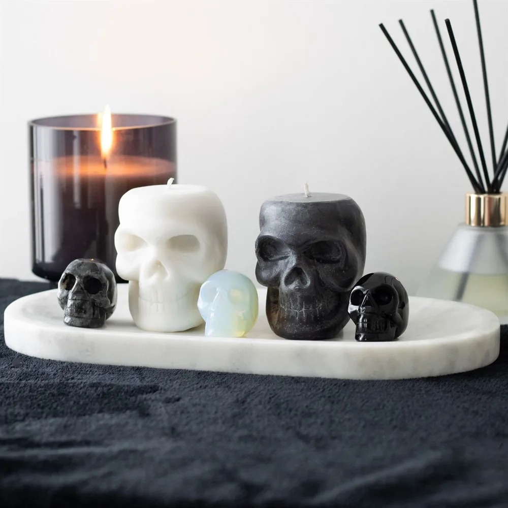 Set of 12 Opium & White Sage Skull Candles in Display - Image 6