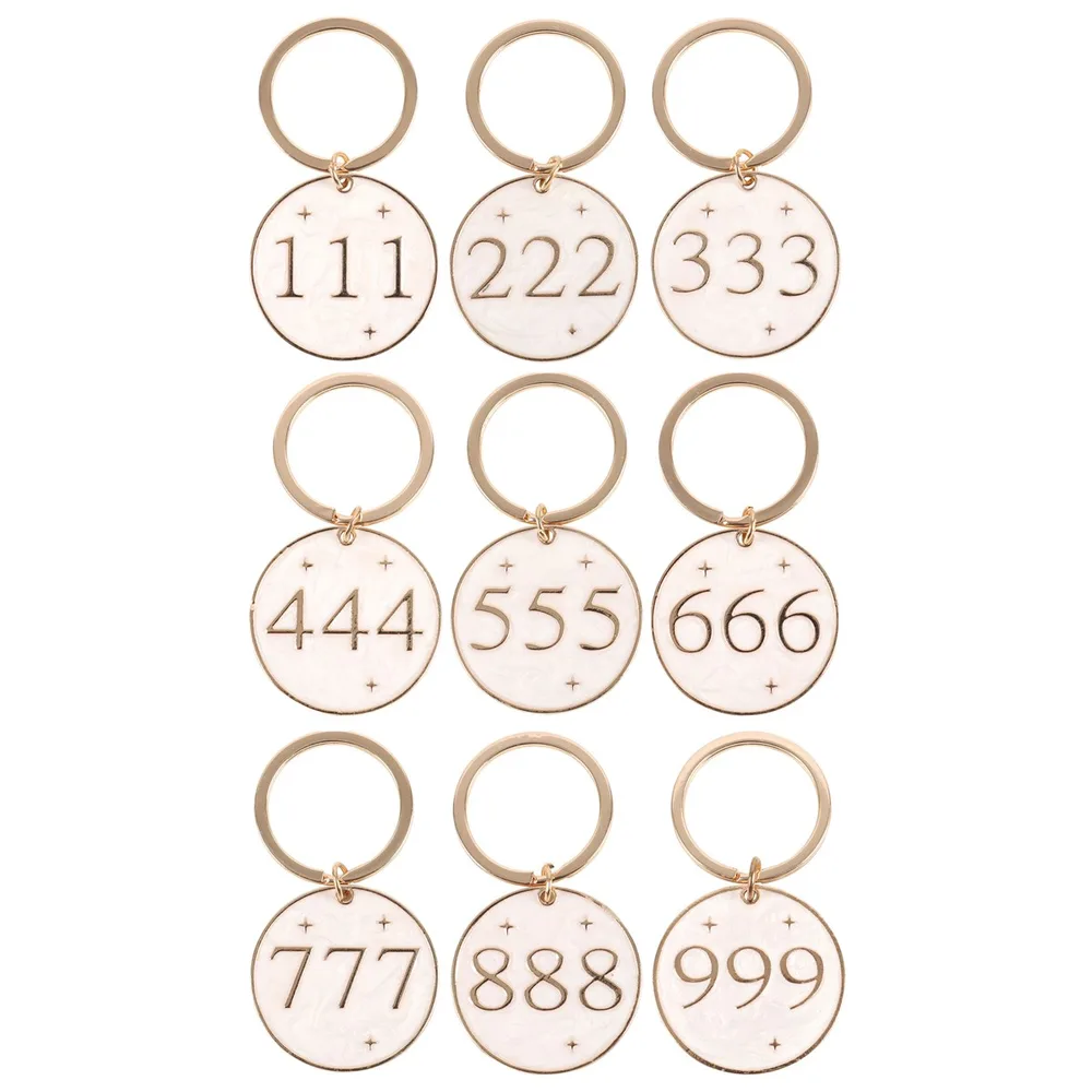 Set of 36 Angel Number Keyrings on Display - Image 4