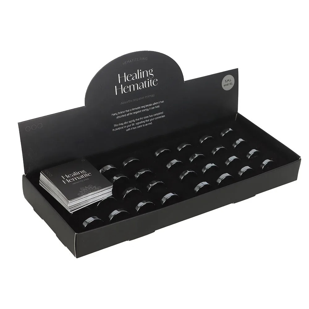 Set of 32 Healing Hematite Rings in Display - Image 2