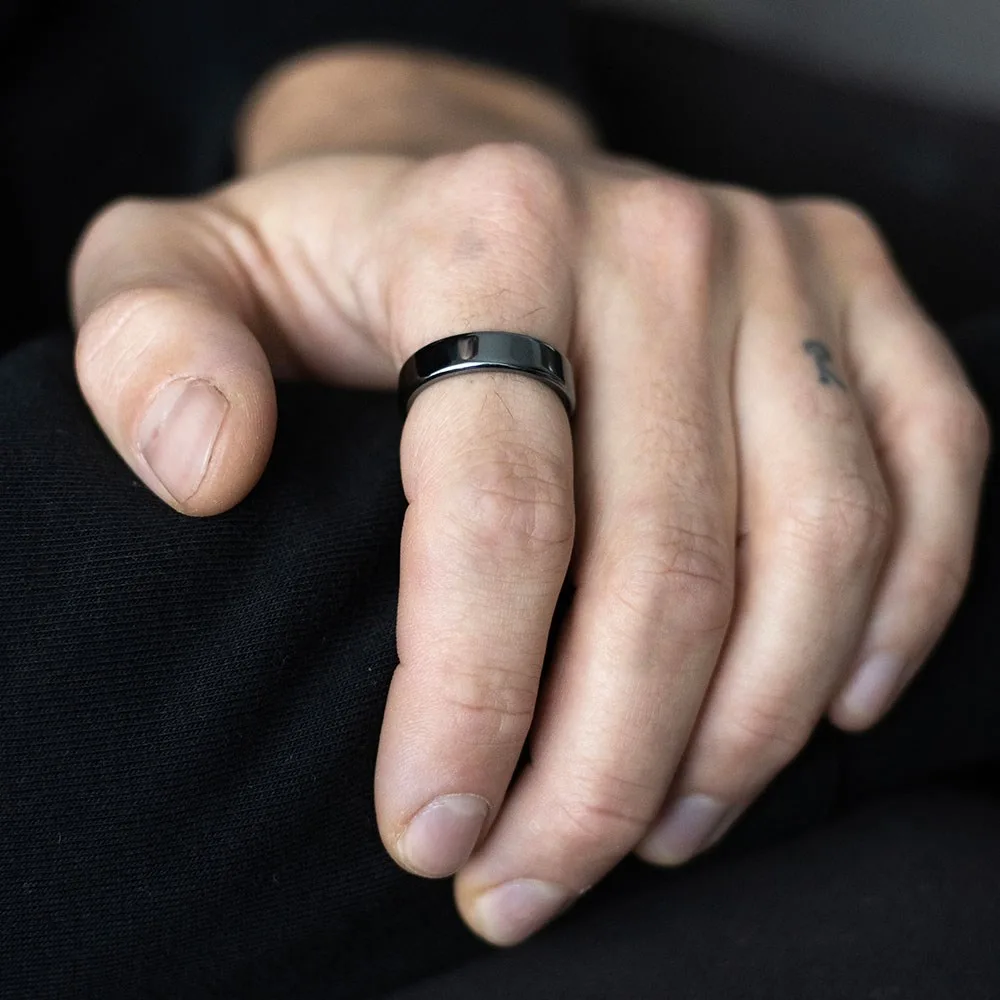 Set of 32 Healing Hematite Rings in Display - Image 4