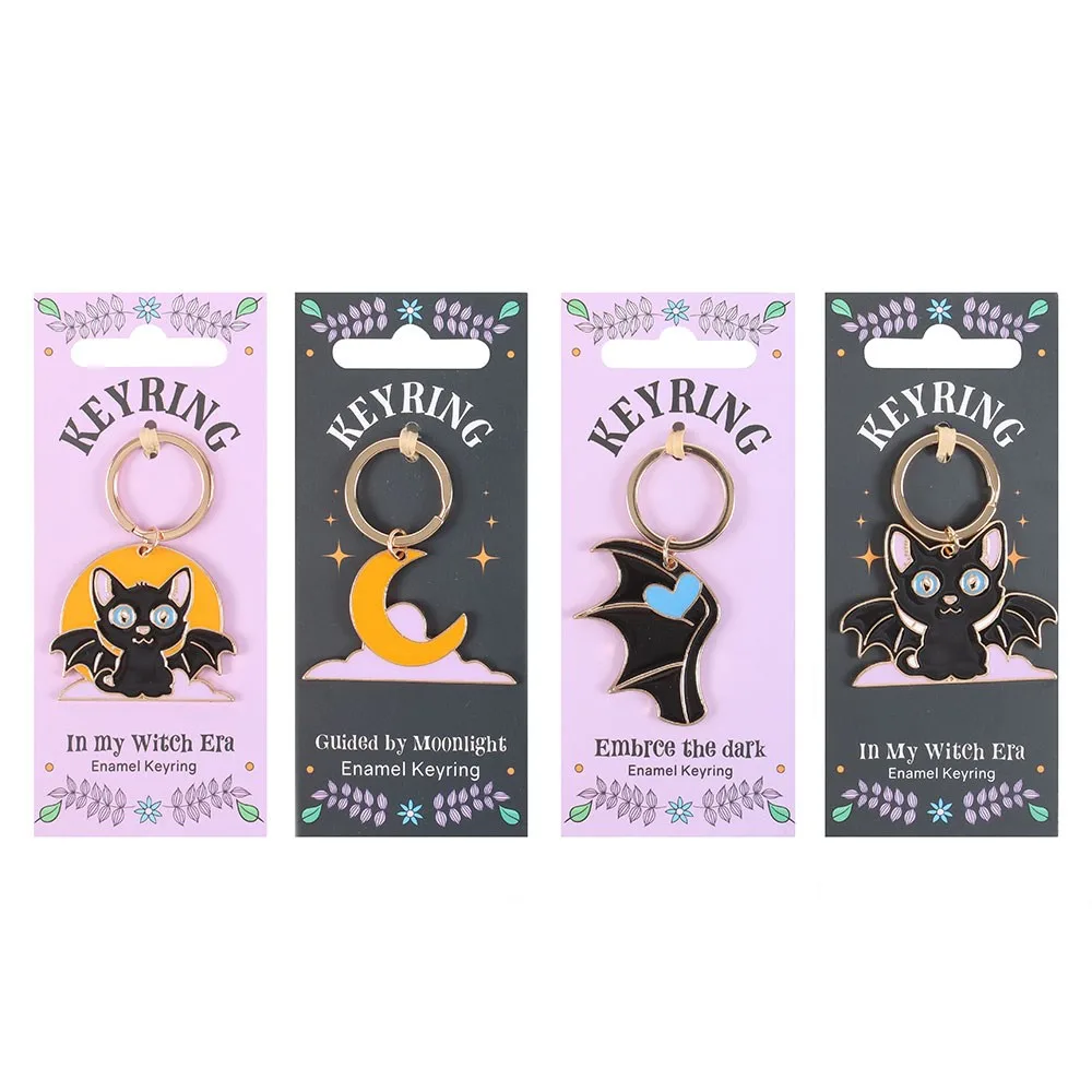 Set of 24 Cute and Creepy Keyrings on Display - Image 4