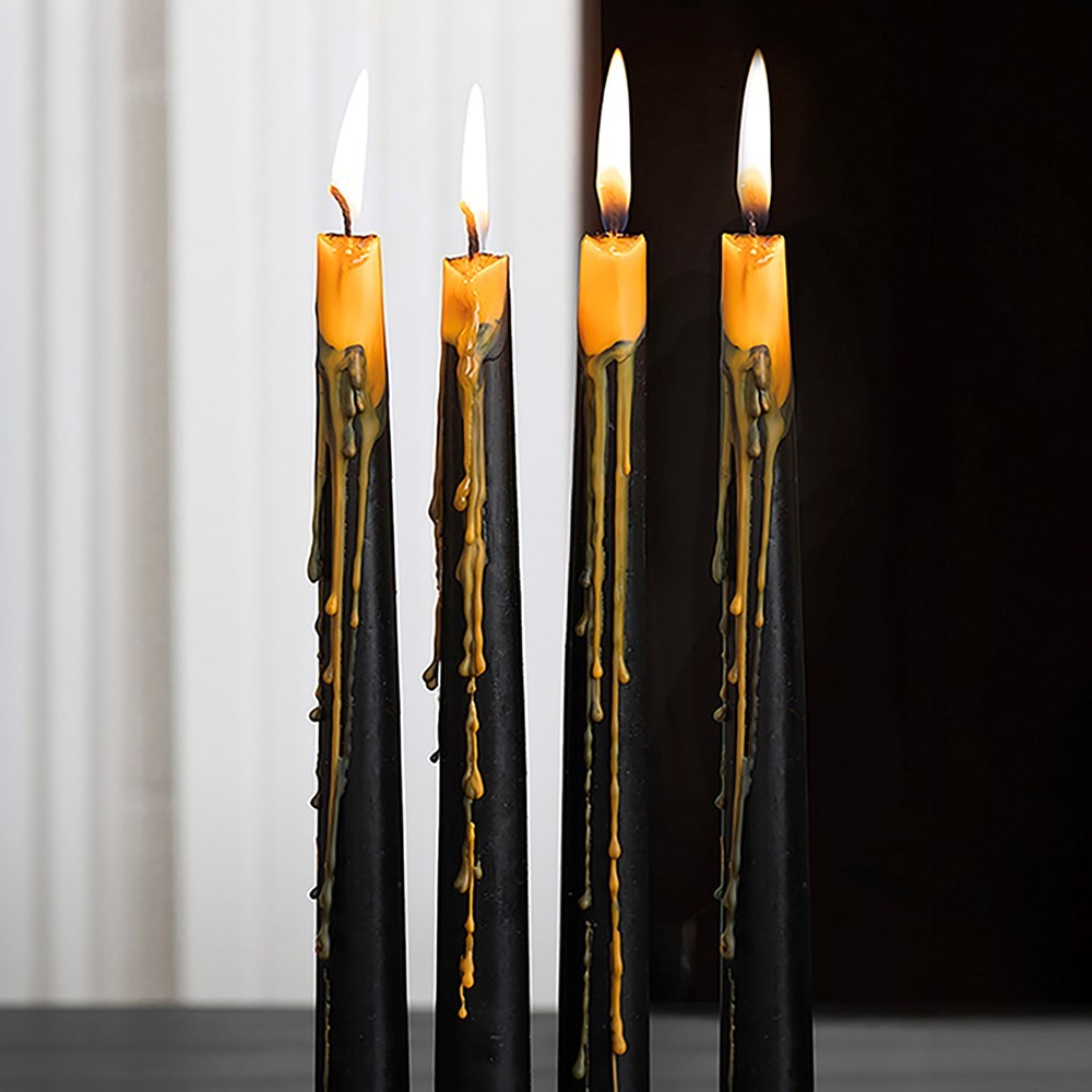 Set of 4 Pumpkin Guts Oozing Taper Candles Set of 4 Pumpkin Guts Oozing Taper Candles