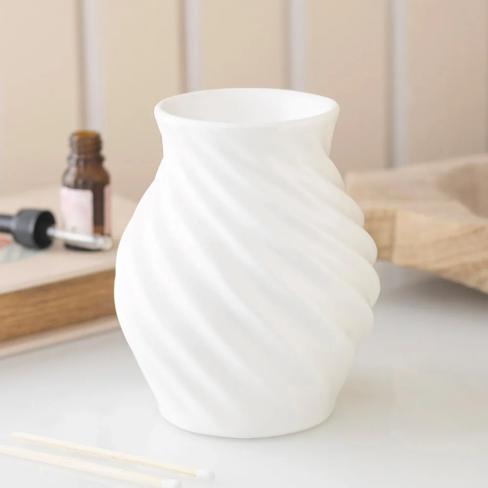 Spiral Swirl Oil Burner and Wax Warmer Spiral Swirl Oil Burner and Wax Warmer